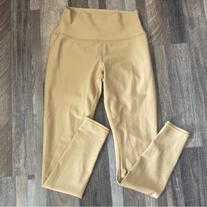 ALO Yoga Gold leggings and shirt